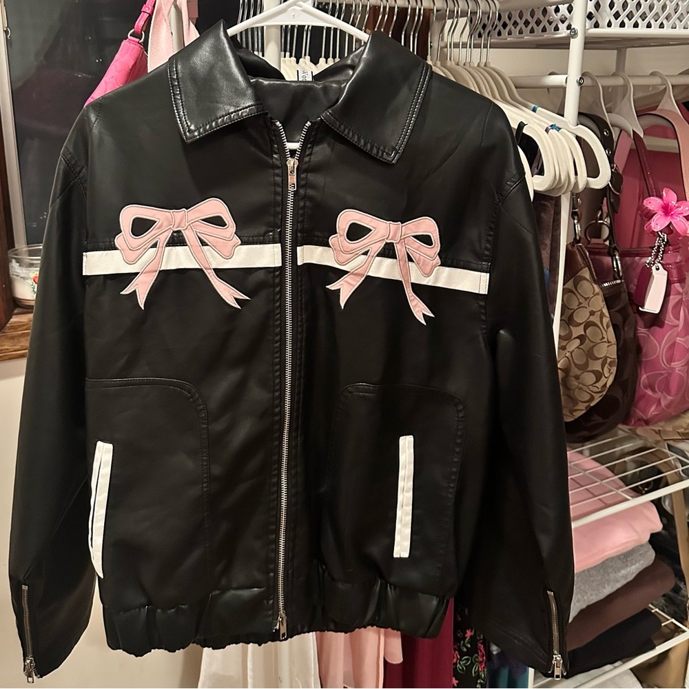 Black Jacket with Pink Bow Details